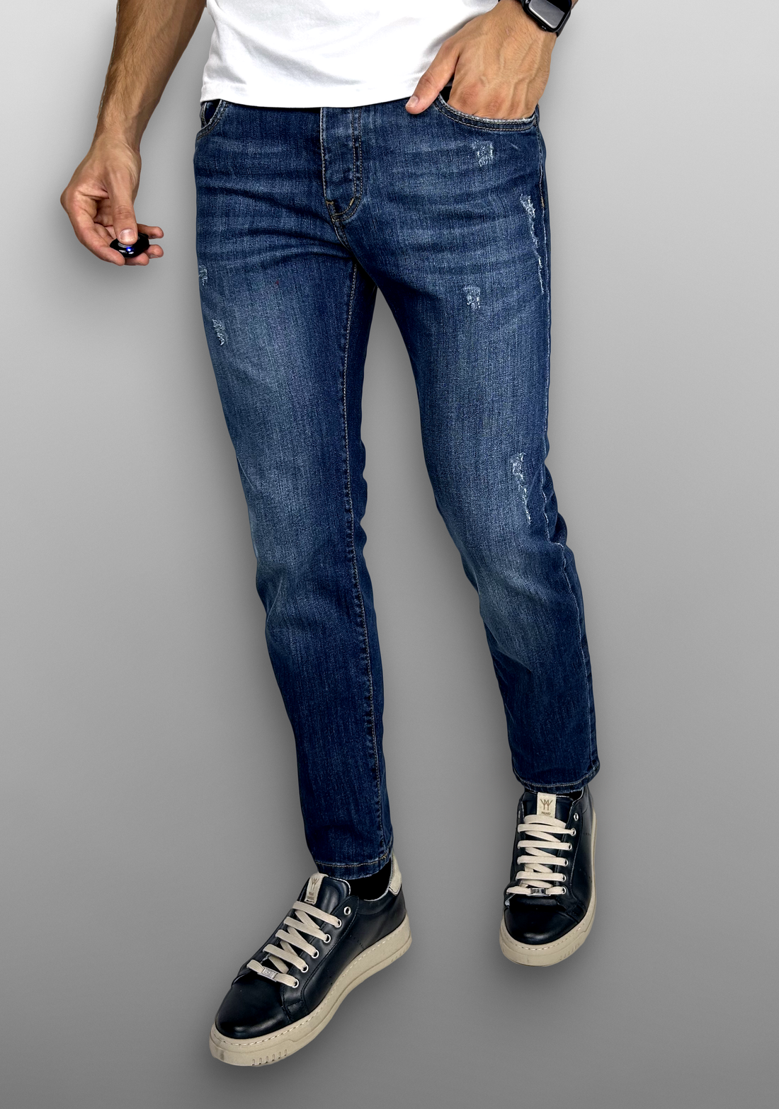 Jeans regular lavaggio medio usurato