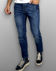 Jeans regular lavaggio medio usurato