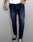 Jeans regular lavaggio con baffi