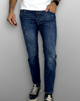 Jeans regular lavaggio medio usurato