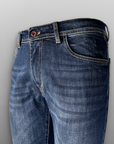 Jeans regular lavaggio con baffi