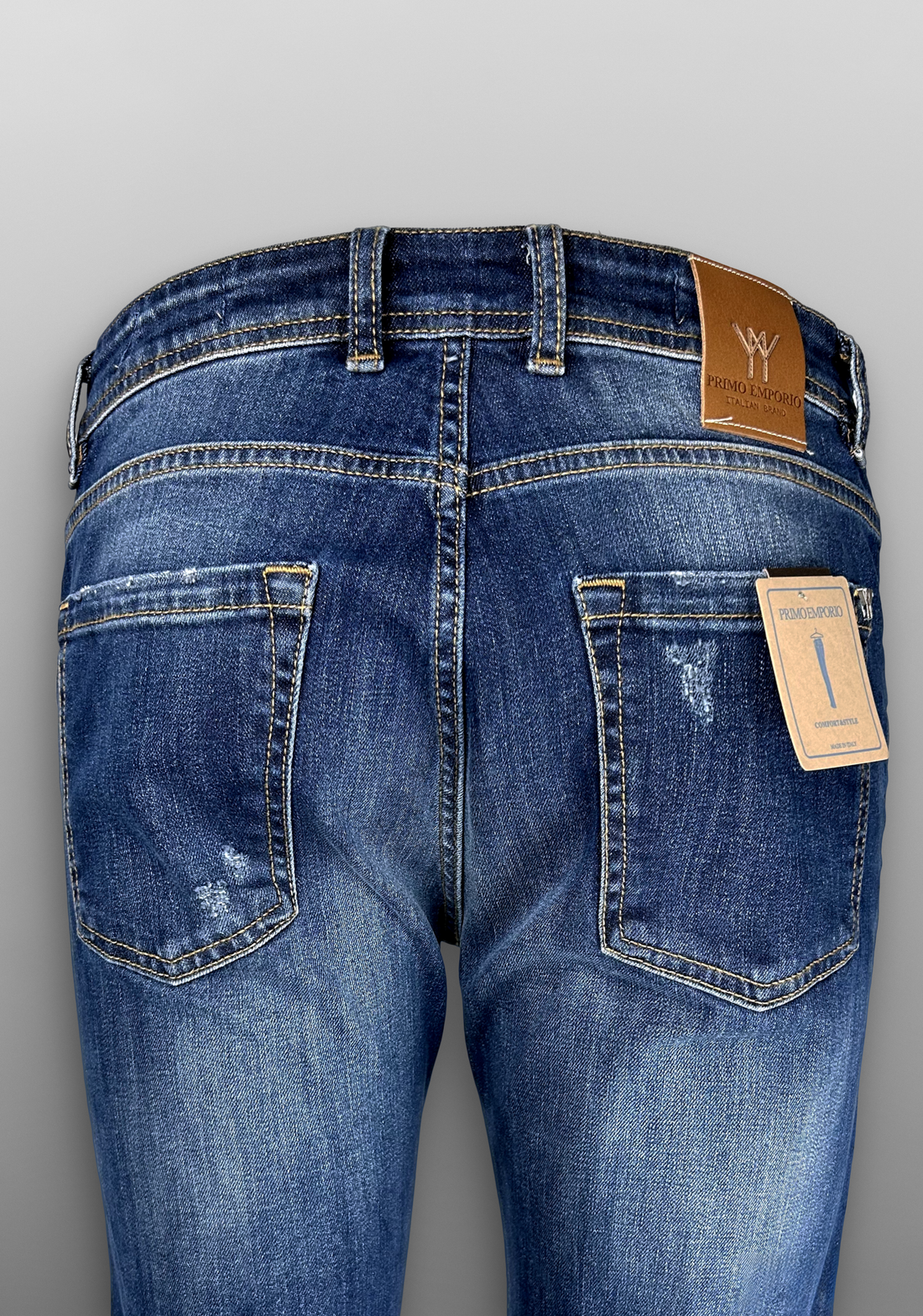 Jeans regular lavaggio medio usurato