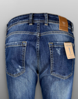 Jeans regular lavaggio medio usurato