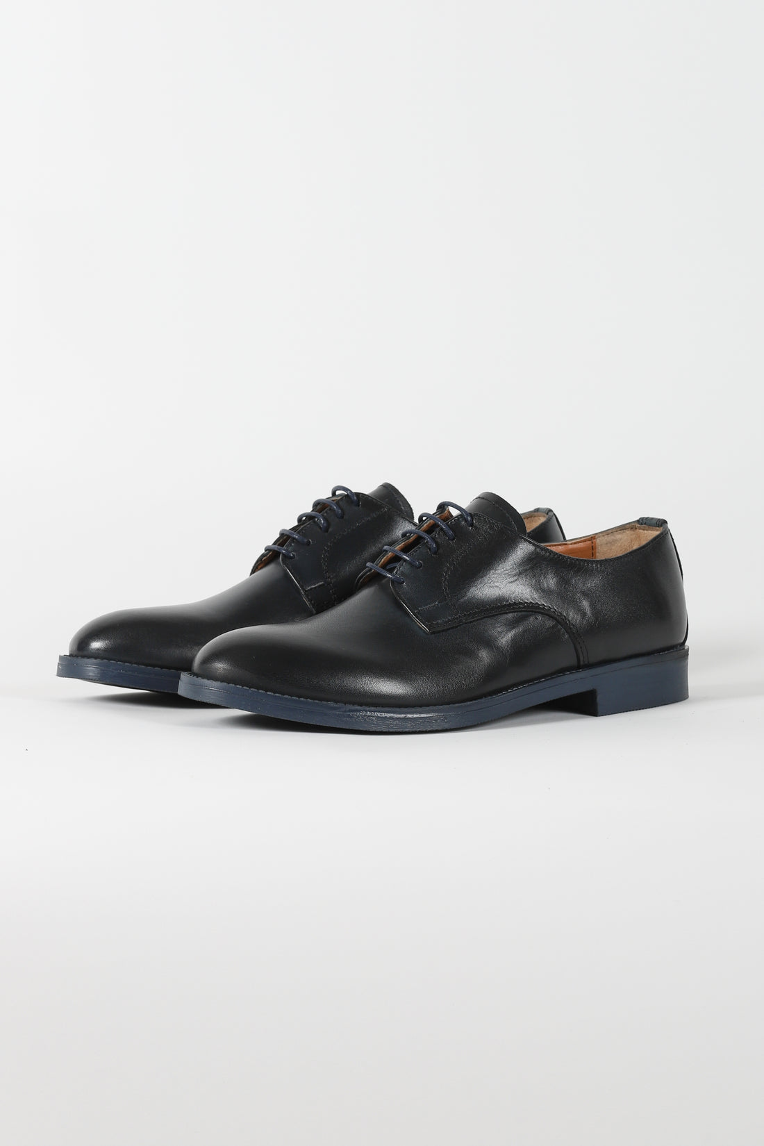 Blue lace-up shoe with rubber sole